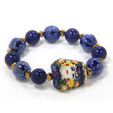Carica l'immagine nel visualizzatore di Gallery, Bracciale elastico con testa in ceramica dipinta a mano