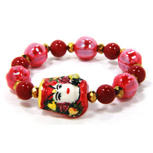 Carica l'immagine nel visualizzatore di Gallery, Bracciale elastico con testa in ceramica dipinta a mano