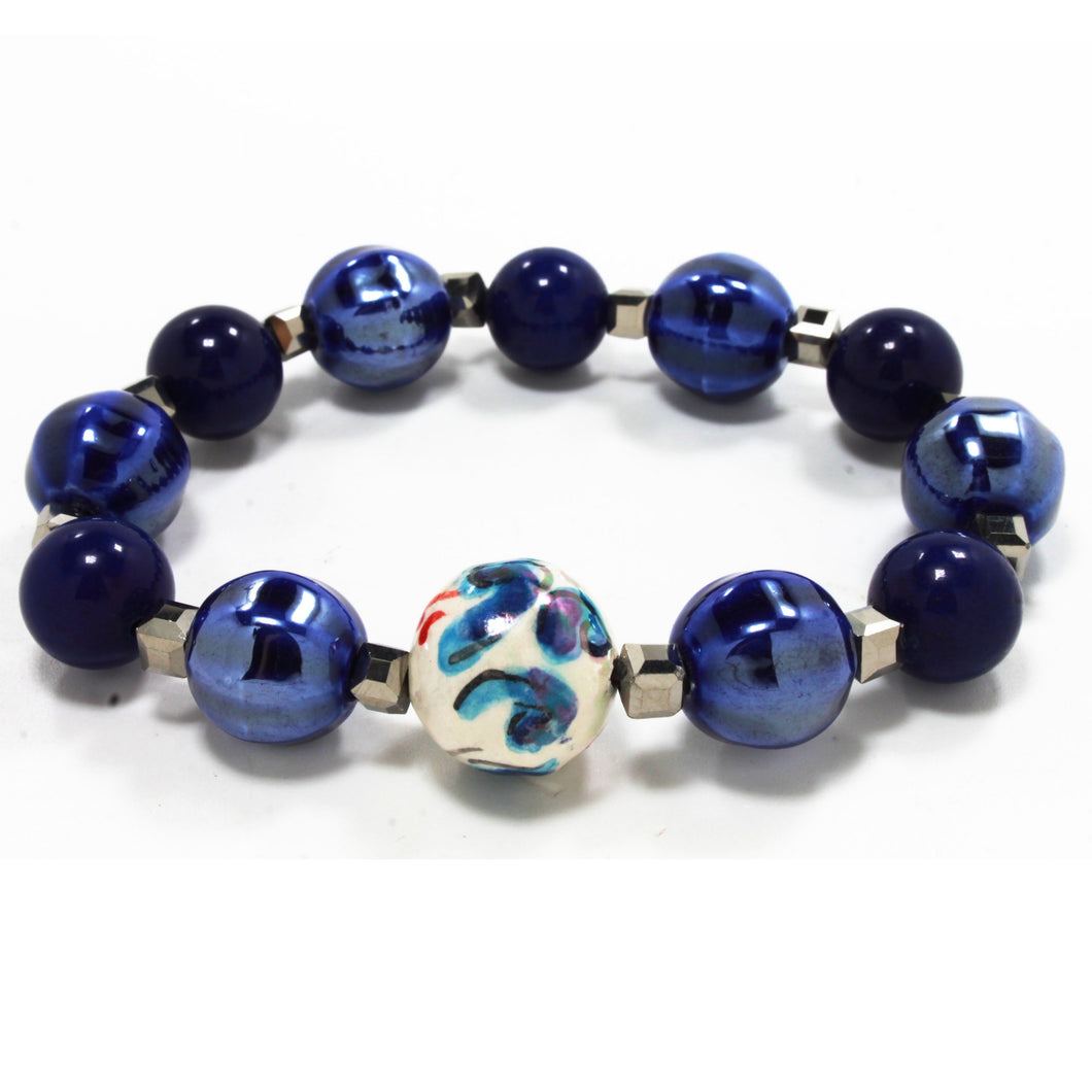 Bracciale elastico con pallina in ceramica dipinta a mano