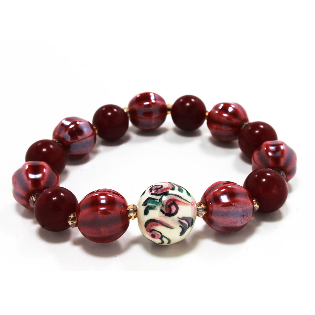 WOMAN ELASTIC BRACELET WITH BALL IN HAND PAINTED CERAMIC. MADE IN ITALY.