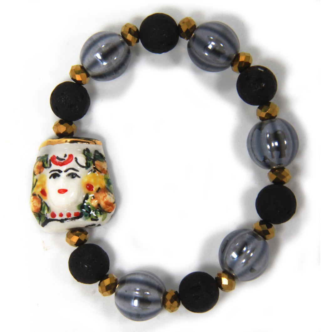 Elastic bracelet with hand-painted ceramic head