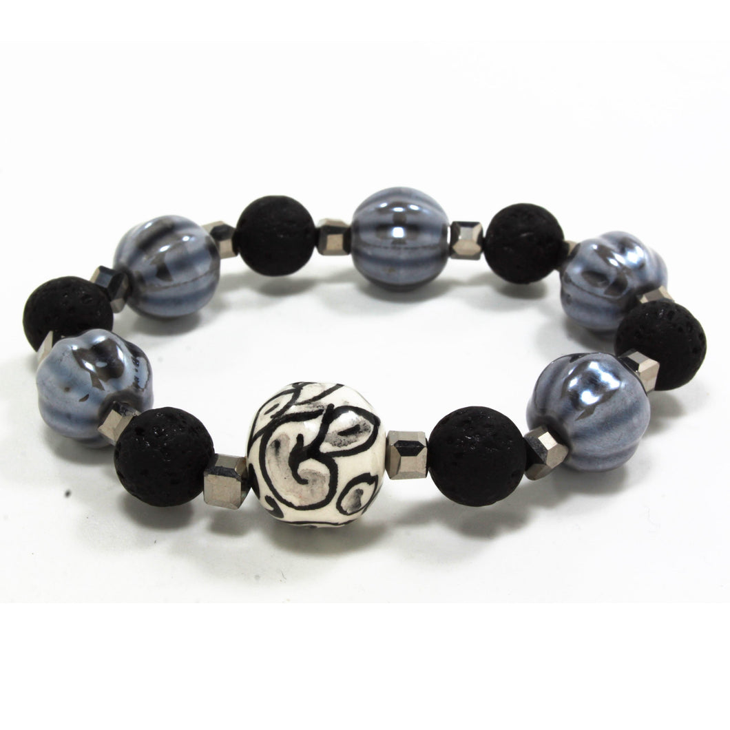 WOMAN ELASTIC BRACELET WITH BALL IN HAND PAINTED CERAMIC. MADE IN ITALY.