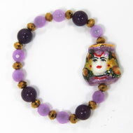 WOMAN ELASTIC BRACELET WITH CALTAGIRONE HEAD IN HAND PAINTED CERAMIC. MADE IN ITALY.