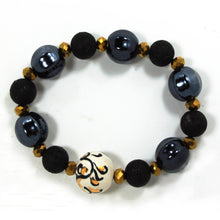Load image into Gallery viewer, WOMAN ELASTIC BRACELET WITH BALL IN HAND PAINTED CERAMIC. MADE IN ITALY.
